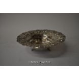 A small white metal bowl, the rim repousse with fruiting pears, stamped 925, 136g