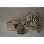 A silver plated muffin warmer of scallop form; an oval plated biscuit barrel; a white metal