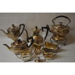 A silver plated four piece tea service; a further three piece example and a silver plated spirit