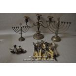 Two silver plated menorah, the tallest 27cm; a silver plated candlabrum; a quantity of silver plated