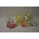 Six Victorian glass baskets in various colours and shapes, the tallest 21cm.