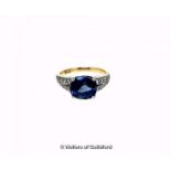 Sapphire and diamond ring, central cushion cut blue sapphire, dimensions approximately 8.8 x 7.