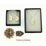 *Crystal pendant necklace, a pair of crystal drop earrings, a brooch, and a scarf clip