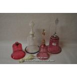 Two Nailsea type glass bells, one in cranberry glass, the other blue and white; two cranberry