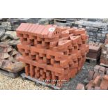*PALLET OF APPROX ONE HUNDRED AND SIXTY TRIANGULAR COPING BRICKS