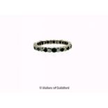 Diamond full eternity ring, alternating black and white round cut diamonds, rubover set in white