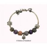 *Pandora bracelet, with ten charms/spacers, length 20cm (Lot subject to VAT)
