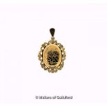 9ct yellow gold locket pendant with a floral design border, weight 7.5 grams