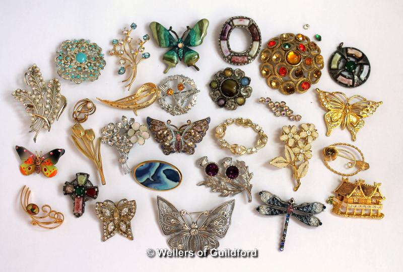 Selection of twenty-six costume brooches, a pendant and a clip