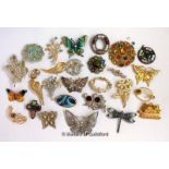 Selection of twenty-six costume brooches, a pendant and a clip