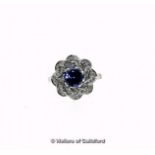 Tanzanite and diamond dress ring, round cut tanzanite surrounded by round brilliant cut diamonds set