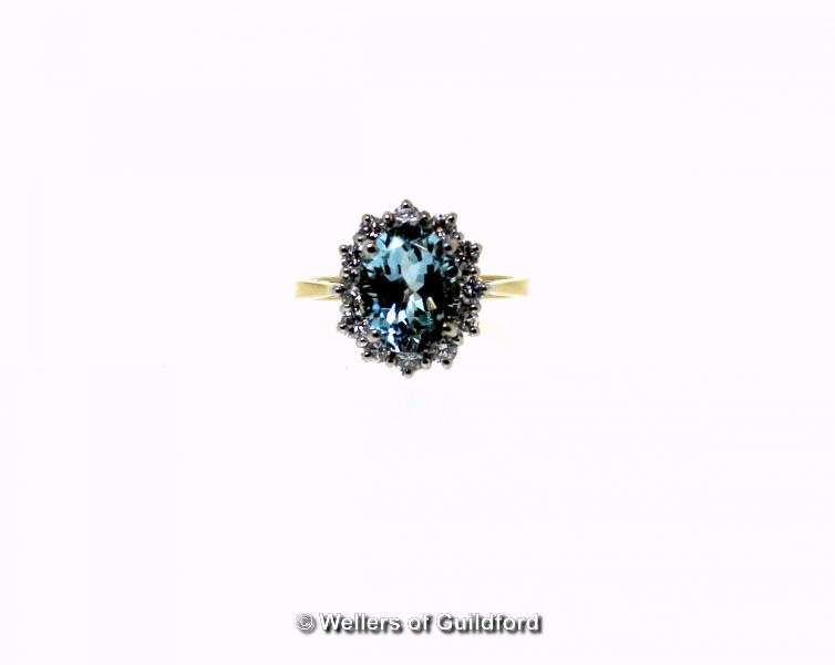 *Aquamarine and diamond cluster ring, oval cut aquamarine, weighing an estimated 2.50cts, with a - Image 2 of 2