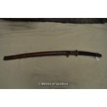 A Japanese Army officer's sword, pattern 1933 Shin Gunto with leather grip, brass tsuba, metal