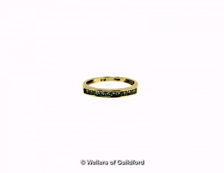 Diamond set half eternity ring, round brilliant cut diamonds channel set in 9ct yellow gold,