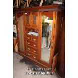 LARGE WOODEN DOUBLE WARDROBE COMPLETE WITH CENTRAL CUPBOARD WITH CARVED DOORS, MIRROR AND TWO OVER