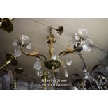 ORNATE BRASS THREE BRANCH CANDELABRA WITH TIER DROP PENDANTS AND GLASS SHADES