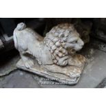 PAIR OF COMPOSITION STONE LIONS WITH RAMS HEADS