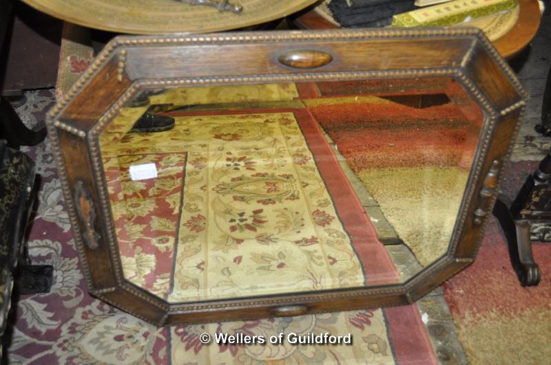 A circular Indian brass tray and an oak framed mirror. - Image 2 of 2