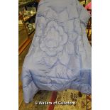 A vintage blue eiderdown, 140 x 168cm.