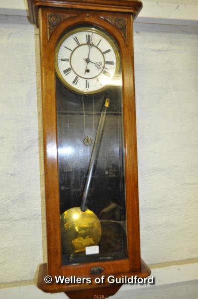 A mahogany regulator, white enamel dial with Roman numerals, 94cm.