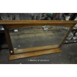 An oak rectangular overmantle mirror, 115cm wide.