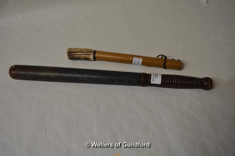 An old oak truncheon with traces of painted finish, ribbed handle; a cosh with stag antler handle (