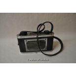 Romac Radio Corporation radio in black leatherette with chrome mounts.