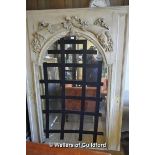 A large mirror with arched top and carved ribbon decoration carved, the rectangular frame 185 x