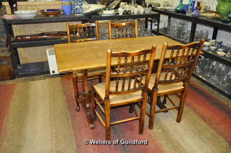 A small oak refectory table, 138 x 74cm, and set of four spindle back oak chairs with rush seats. - Image 2 of 4