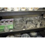 A large quantity of glassware including a boxed set of six gilt decorated wine glasses, bowls, jugs,