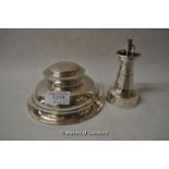 A silver capstan inkwell, Chester 1923, 14cm diameter; a silver object in the shape of a lighthouse,