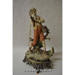 A Capi di Monte style figure of a fisherman on gilt metal base, 39.5cm.