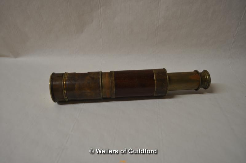 An antique brass and wood telescope, unsigned.