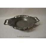 A Tudric pewter twin handled dish moulded with flowers, pattern no. 0287, 28cm wide.