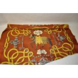 Hermes silk scarf in brown with yellow rope twist pattern and central figure or a horse, Palefroi