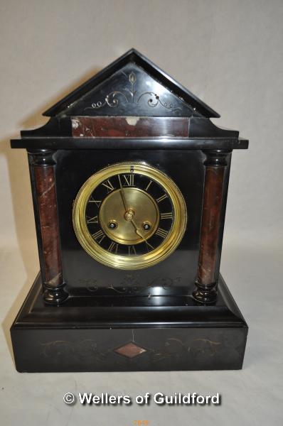 *Black marble mantle clock, decorated with columns to flanks (Lot subject to VAT)