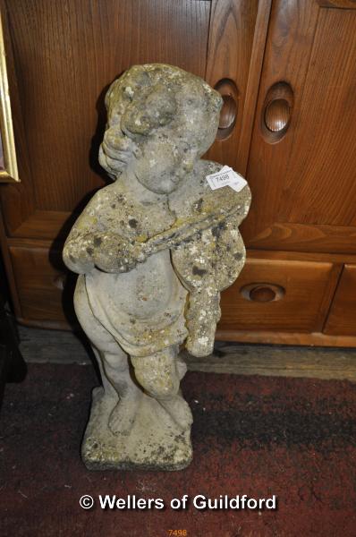 A concrete garden statue of a boy playing the violin, 60cm.