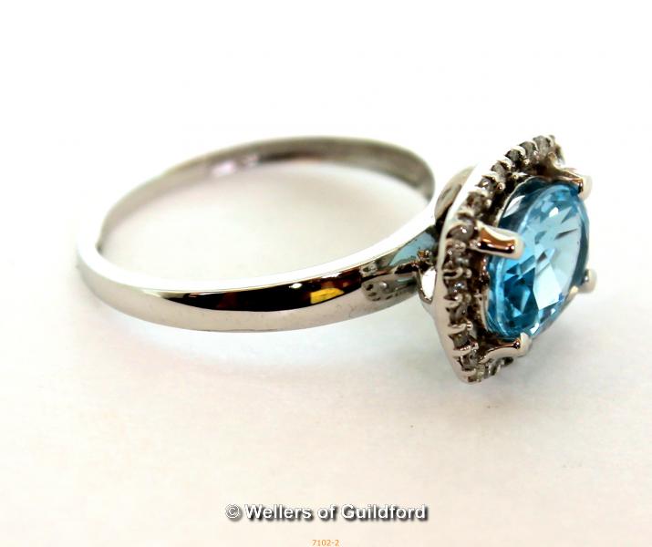 *2ct oval blue topaz and natural diamond Halo ring, 10K white gold (Lot subject to VAT) - Image 2 of 3