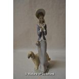 Lladro figure of a lady with an Afghan hound, 33cm.