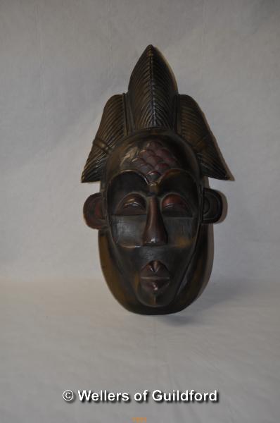 An ornamental African carved wooden mask, 46.5cm.