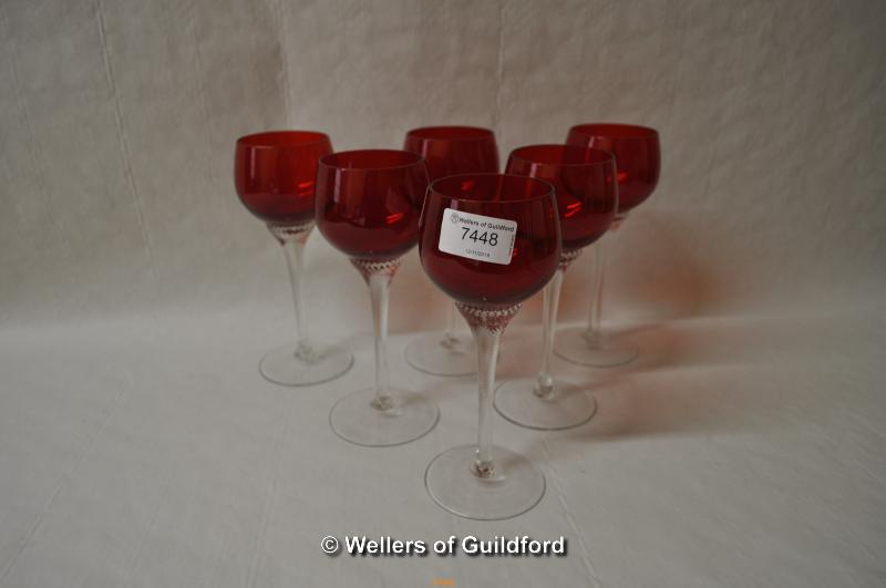 A set of six ruby glass hock glasses.