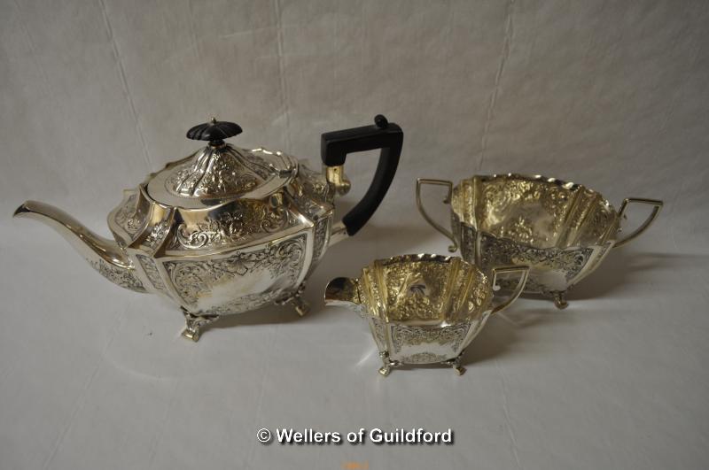 A group of silver plated three piece tea services and part tea services. - Image 3 of 4