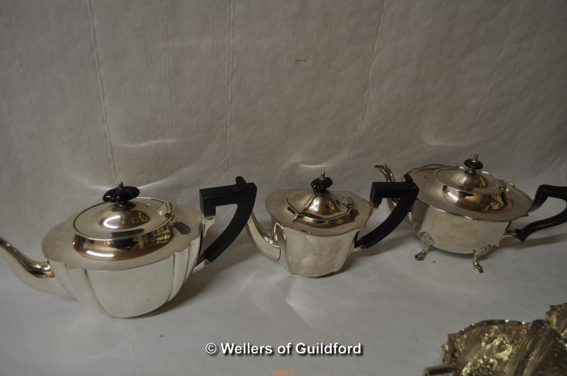 A group of silver plated three piece tea services and part tea services. - Image 2 of 4