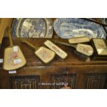 A 1950's dressing table set with ornate brass filigree, comprising a jewellery box, mirror (lacks