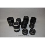 Nine camera lenses. Models include; Canon Zoom lens EF-s 18-55mm 1:3.5-5.6 IS II with Kenko Smart MC