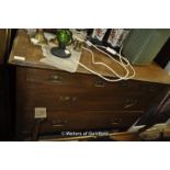 An Edwardian oak dressing chest.