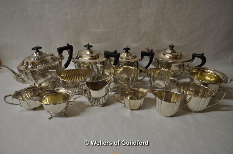 A group of silver plated three piece tea services and part tea services.