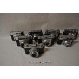 Eight Kodak cameras with lenses. Camera bodies include - Retinette (x2), 35 (x2), Retinette IA,