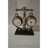 A nautical theme clock/barometer/thermometer, the stand modelled as an anchor entwined with rope,