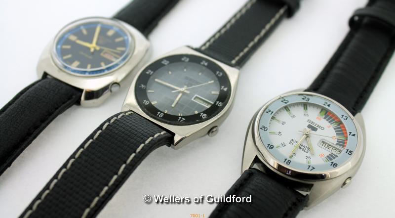 *Three Seiko watches with black leather straps (Lot subject to VAT)